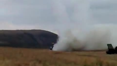 Georgian LAR-160 MLRS Firing on Russian columns 2008