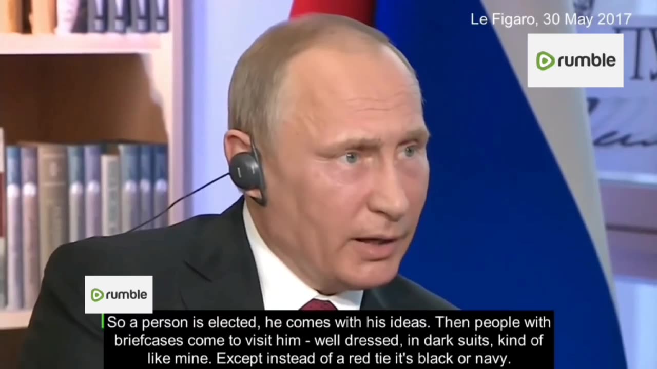 "Men in dark suits" rule the US - Putin on Deep State