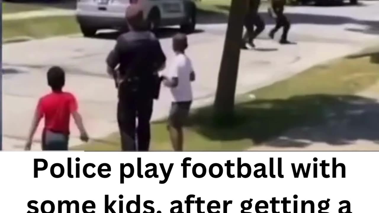 Cops play football with troubled kids.