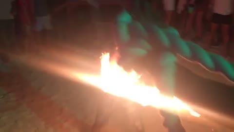 Man Jumping Rope on Fire at Full Moon Party Fails