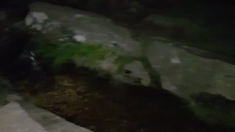 Mini man made waterfall feature. Dartmoor. Night hiking
