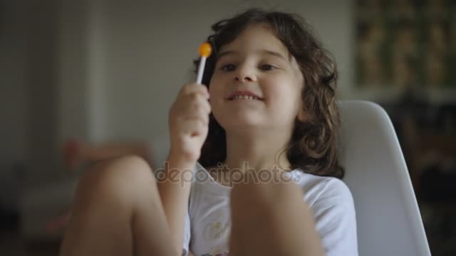 eboy Eating Sweet Lollipop Sitting White Plastic Chair!