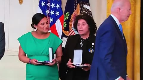 Woman literally ROLLS HER EYES at fumbling Biden during medal ceremony