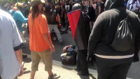 Aug 4 2018 Portland 01.5 Antifa Attacks person on their own side for holding American Flag