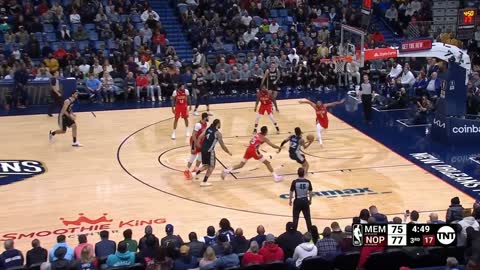 Ja Morant switches hands mid air for insane dunk over CJ McCollum 😱