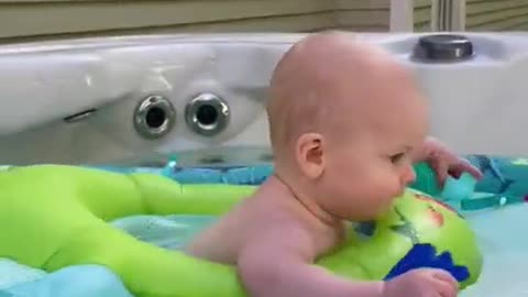 Baby learns to swim