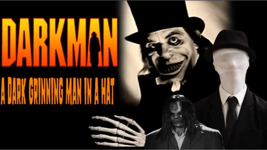 CLYDE LEWIS, 2022-06-27 DARKMAN – A DARK GRINNING MAN IN A HAT W HEIDI HOLLIS