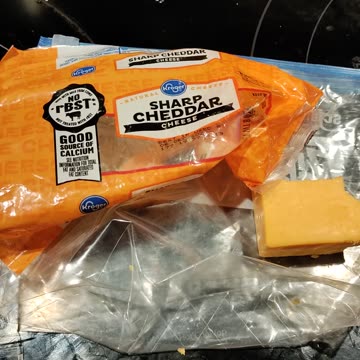 Eating Kroger Sharp Cheddar Cheese, Dbn, MI, 8/4/23