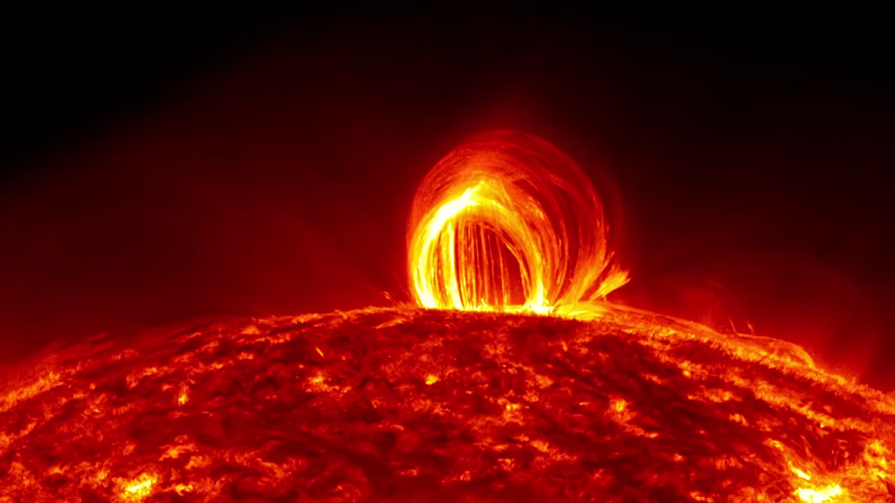 Stunning footage of fiery looping rain on the sun captured by NASA's SDO