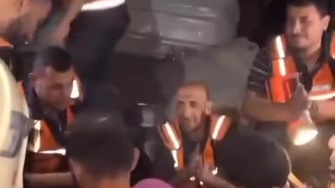 Civil defense crews rescue people from the rubble