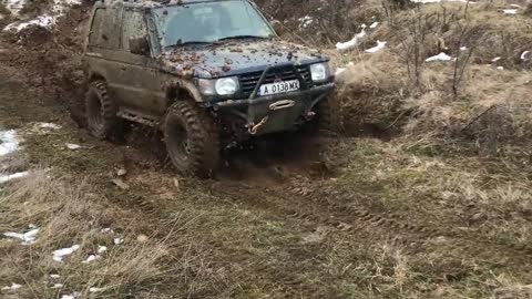 CAR IN THE MUD