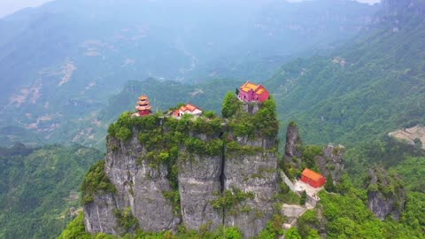 The mountain tops were hidden beneath a veil of mist