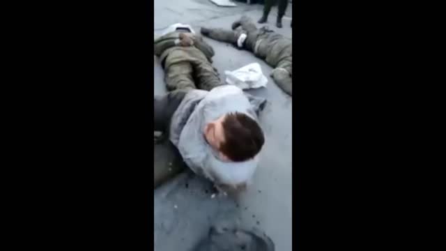 WAR CRIME -Ukrainian Soldiers shooting Russian POW !!!