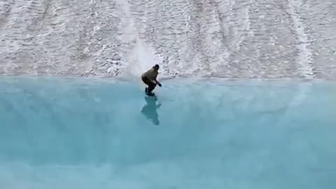 Snowboarding with @SkylerGallardo across this glass-like lake, a superb scene shot