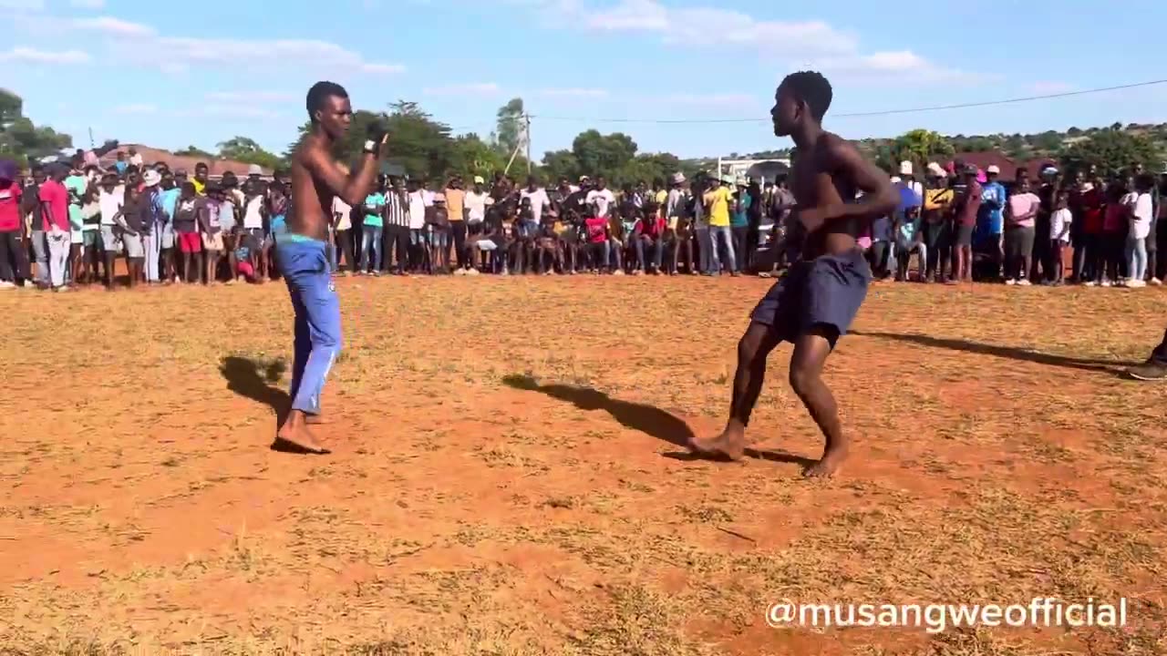 Backflip celebration in a fighting ring,