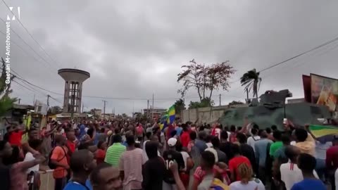 Crowds cheer on the military after a coup in Gabon