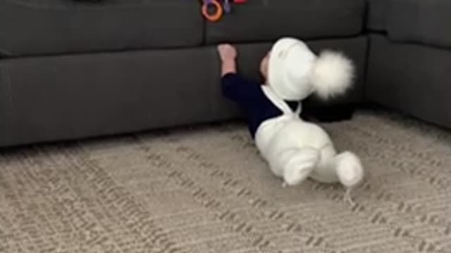 6 months old pulling herself up to stand