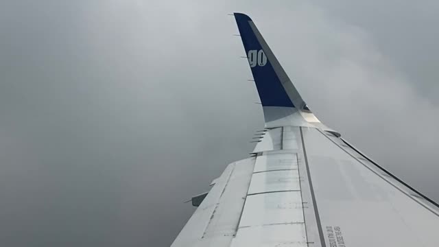 Airplane Wing in Clouds