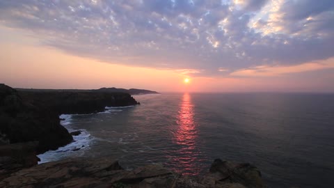 Beautiful Sunrise Over The Ocean Sky Clouds Time lapse Royalty Free HD Stock Travel Video Footage