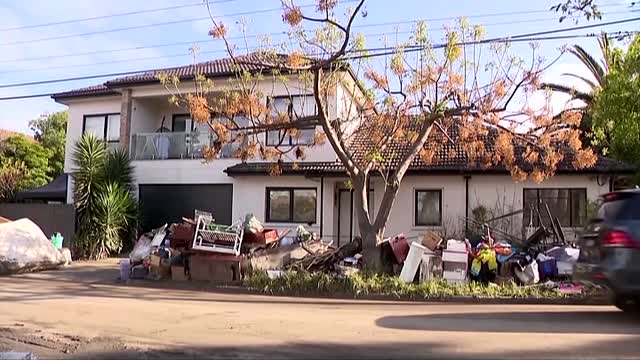 Australians assess flood damage, brace for more rain