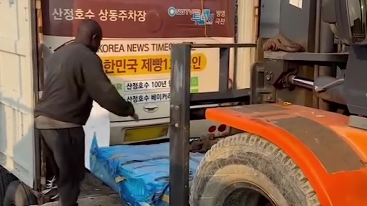 Loading the bus into a container