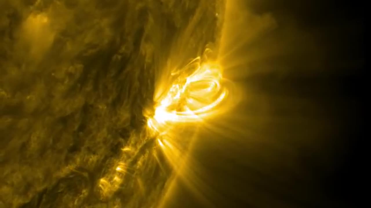 NASA's SDO Watches Magnetic Arches Tower Over Sun's Surface