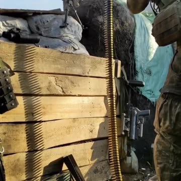 Ukrainian M240 Machine Gunner Lays Down Fire