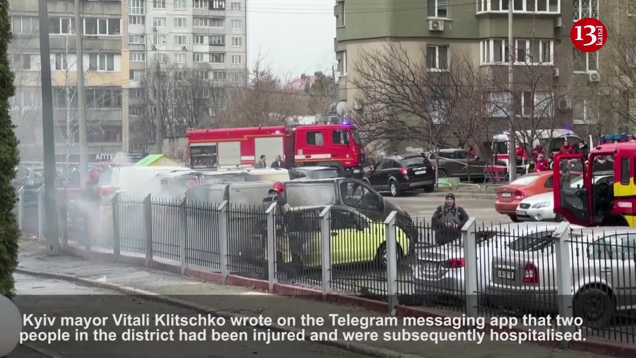 Firefighters work at attack site in Kyiv after missiles hit capital