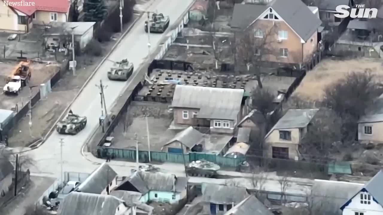 Russian 'Z tank fires at a civilian cyclist' in Bucha, Ukraine