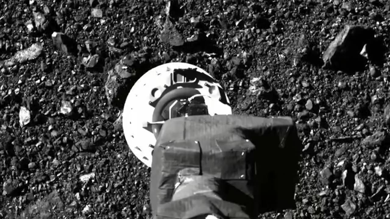 OSIRIS-REx Sample Collection at Asteroid Bennu: SamCam View of TAGSAM