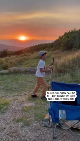 Blind boy loves joining on all the adventures while camping.