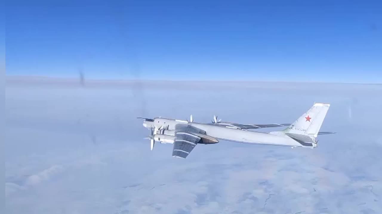 Two Tu-95MS strategic missile carriers conduct scheduled flight over Bering Sea