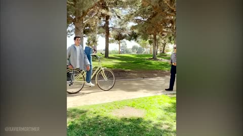 MAN CUT IN HALF ON A BIKE