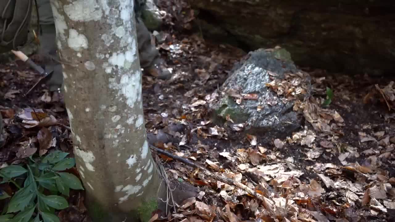 Four excavated shelter.Building underground bunker.Earth hut. primitive technology.Clay stone oven-6