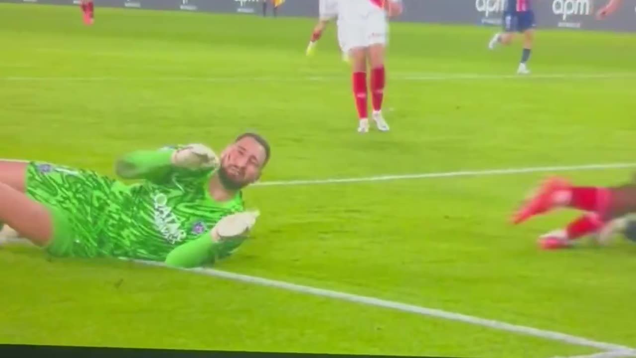 Gianluigi Donnarumma is taken after he receives a horrible tackle to his face.