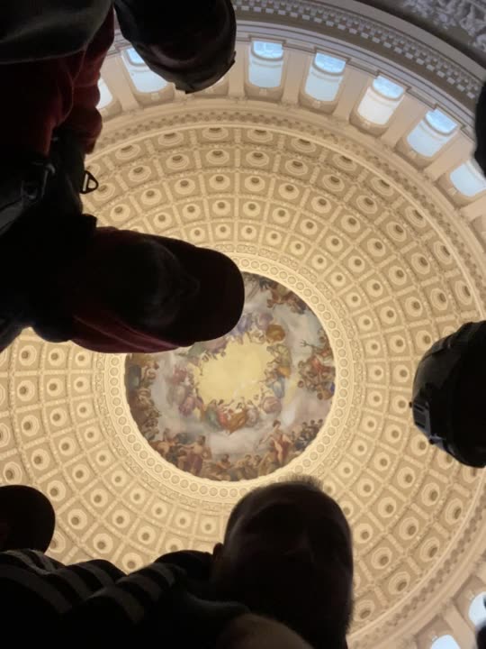 Oath Keepers pray in the Rotunda at 2:44