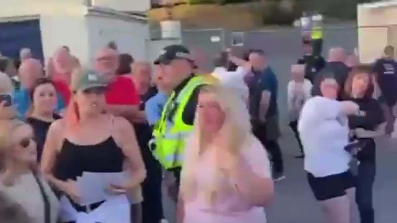 Locals are protesting outside The Stradey Park Hotel in Llanelli against migrants