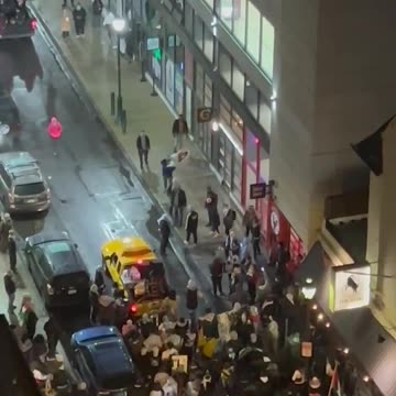 Protestors in Philadelphia stand outside of a Jewish & Israeli owned falafel restaurant