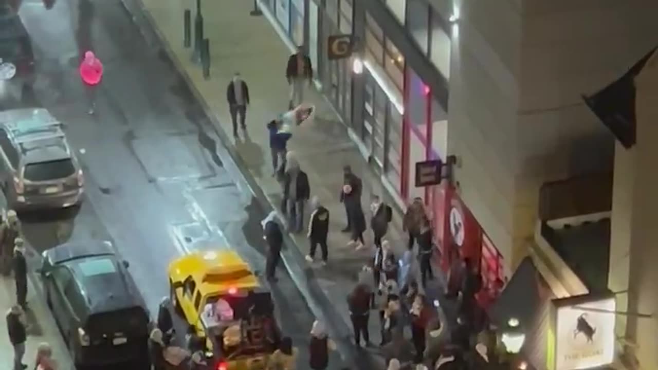 Protestors in Philadelphia stand outside of a Jewish & Israeli owned falafel restaurant