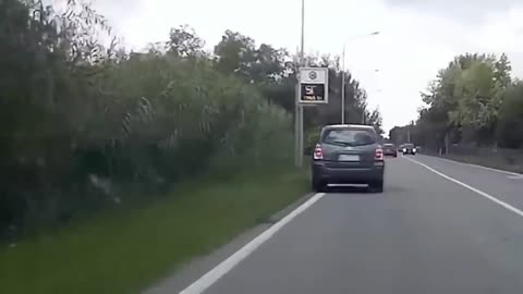 Car in Russia goes Off the Road into a Ditch