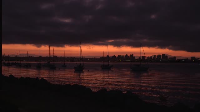 Beautiful light of sun rise over water and city