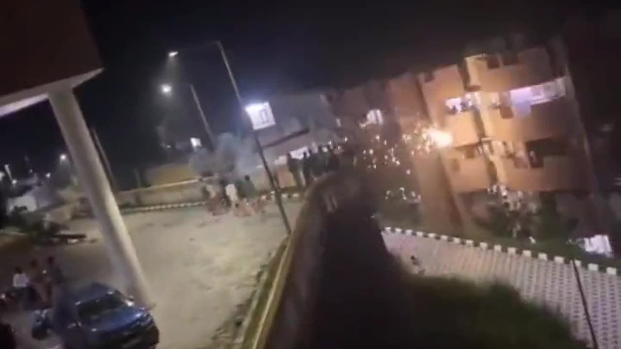 Opposing Apartments Launching Fireworks At Each Other