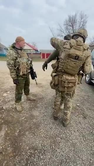 Ukraine: Ukraine soldiers with US flag and SS patches
