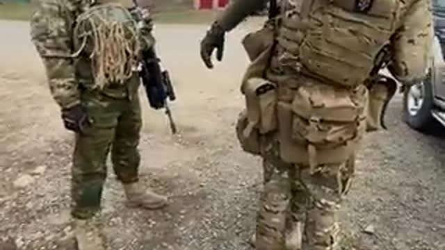 Ukraine: Ukraine soldiers with US flag and SS patches