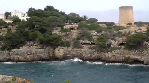 The waves beat beautifully against the rocks