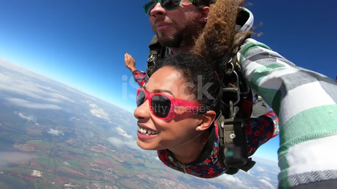 Beautiful Brazilian afro woman practicing skydiving.