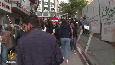 Palestinians rally in Ramallah after ceasefire deal announcement between Hamas and Israel