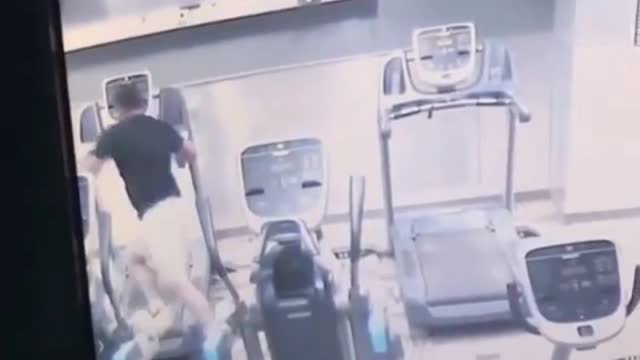 Man caught on camera running over treadmill falling down