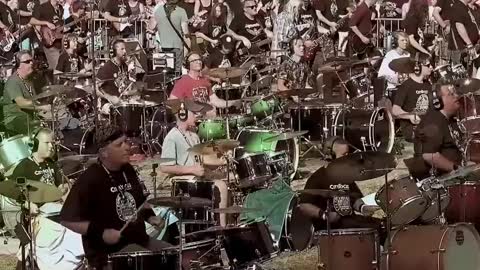 300+ musicians rocking out to Pink Floyd’s “Another Brick in the Wall”