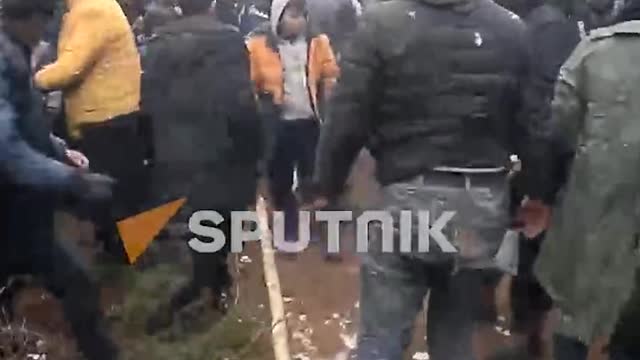 Migrants Fight Over Food At The Belarus-Poland Border